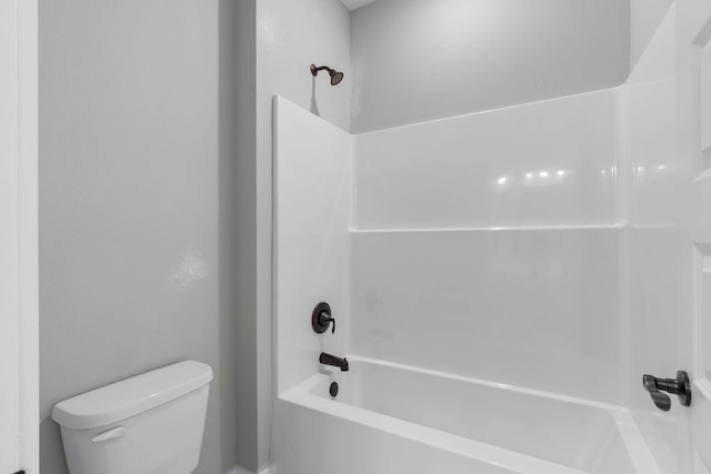 1720 25th St, Niceville, FL 32578 - bathroom featuring toilet and shower / washtub combination