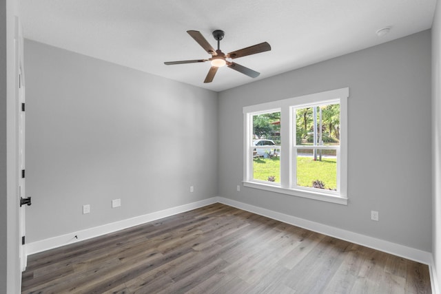 1720 25th St, Niceville, FL 32578 - spare room with ceiling fan, wood finished floors, and baseboards