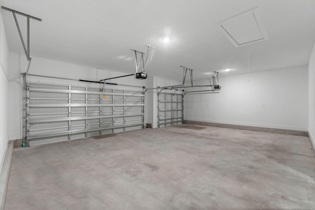 1720 25th St, Niceville, FL 32578 - garage featuring a garage door opener and baseboards