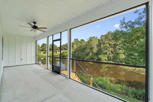 1720 25th St, Niceville, FL 32578 - unfurnished sunroom featuring a water view and a ceiling fan