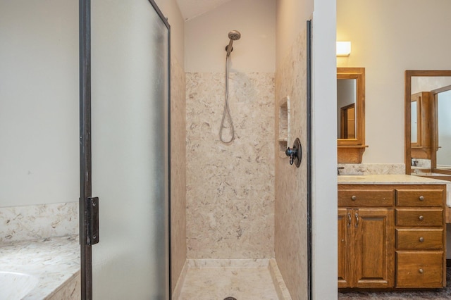 full bath featuring lofted ceiling, a marble finish shower, a tub with marble appearance, and vanity