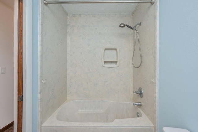 bathroom featuring washtub / shower combination