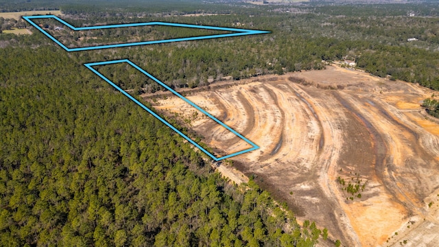 aerial view featuring a forest view