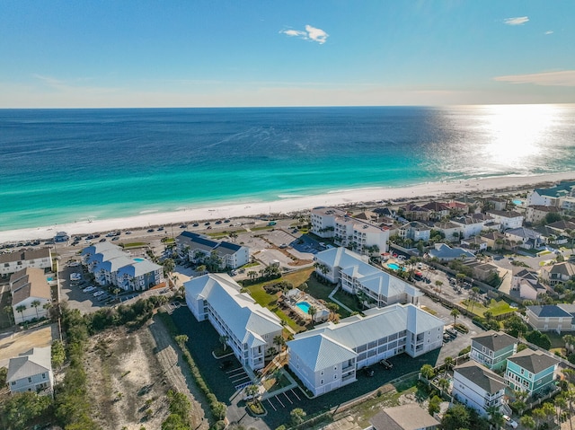 bird's eye view featuring a beach view and a water view