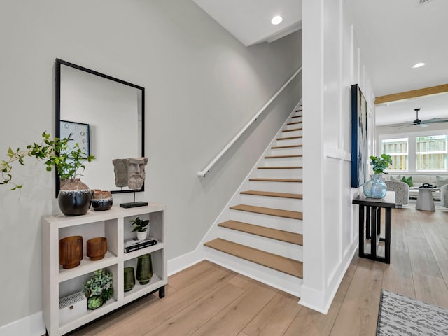 staircase featuring hardwood / wood-style floors