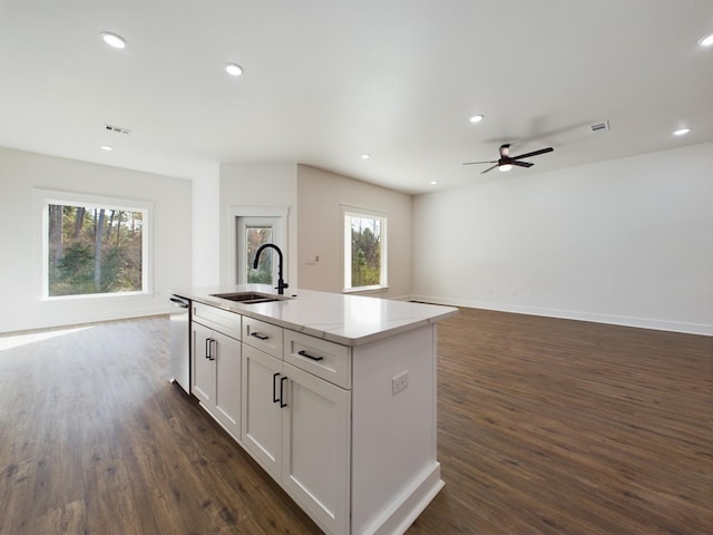 325 Shoal River Dr, Crestview, FL 32539 - kitchen featuring an island with sink, sink, stainless steel dishwasher, white cabinets, and dark hardwood / wood-style floors