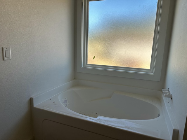 full bathroom featuring a garden tub