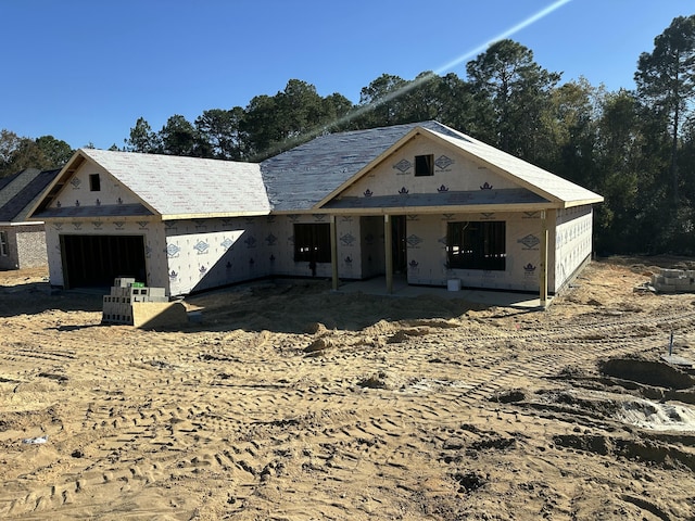 property under construction featuring an attached garage