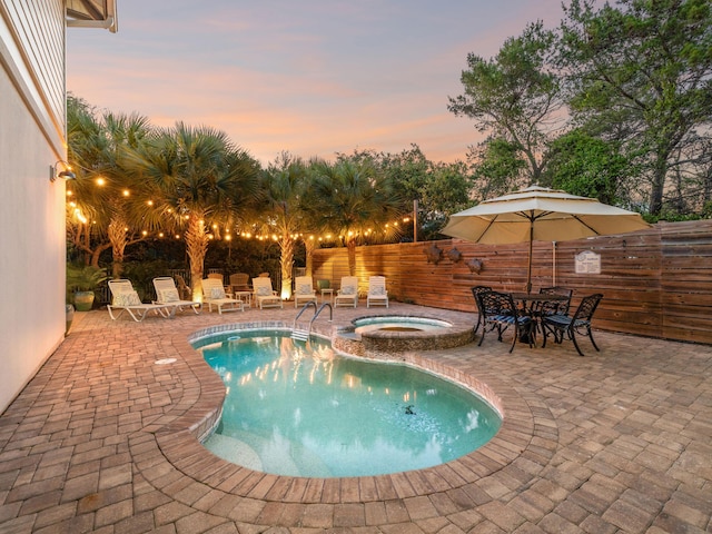 24 High Tide Way, Inlet Beach, FL 32461 - view of swimming pool with a patio area and a pool with connected hot tub