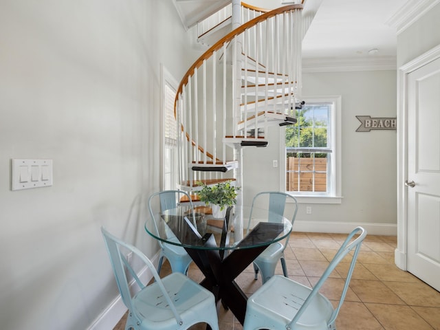 24 High Tide Way, Inlet Beach, FL 32461 - tiled dining room featuring ornamental molding, baseboards, and stairs