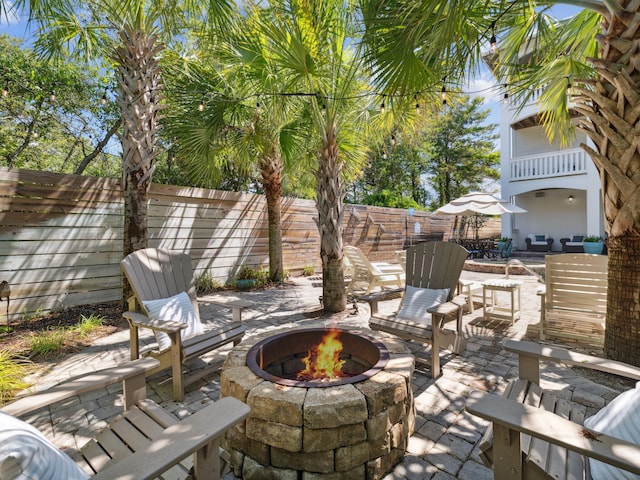 24 High Tide Way, Inlet Beach, FL 32461 - view of patio with an outdoor fire pit