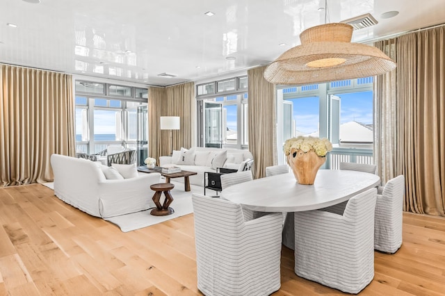 290 Sea Garden St Unit 402, Alys Beach, FL 32461 - interior space featuring plenty of natural light and light hardwood / wood-style flooring