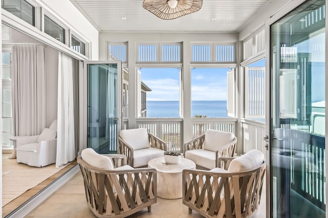 290 Sea Garden St Unit 402, Alys Beach, FL 32461 - sunroom / solarium featuring a water view