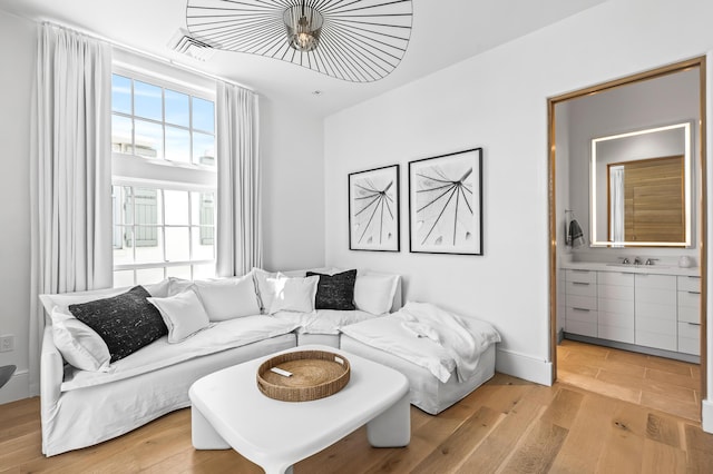 290 Sea Garden St Unit 402, Alys Beach, FL 32461 - living room featuring light wood-type flooring