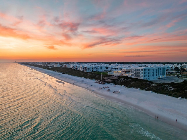 290 Sea Garden St Unit 402, Alys Beach, FL 32461 - aerial view at dusk with a water view and a beach view