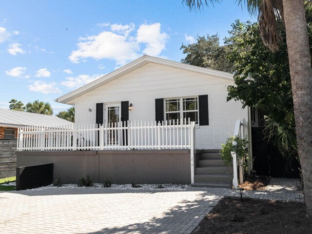 38 Barracuda St, Santa Rosa Beach, FL 32459 - view of front of property featuring brick siding