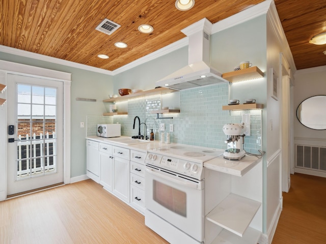 38 Barracuda St, Santa Rosa Beach, FL 32459 - kitchen with open shelves, island exhaust hood, wooden ceiling, and white appliances