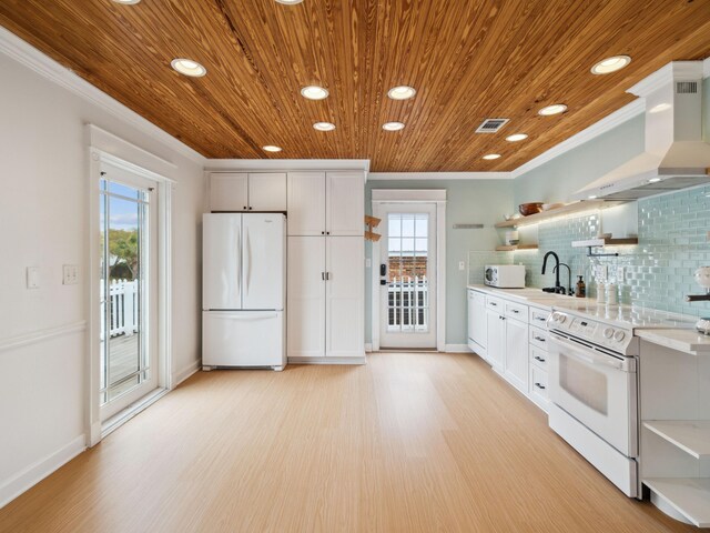 38 Barracuda St, Santa Rosa Beach, FL 32459 - kitchen featuring open shelves, extractor fan, crown molding, and white appliances