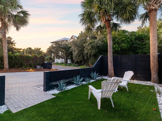 38 Barracuda St, Santa Rosa Beach, FL 32459 - yard at dusk featuring fence