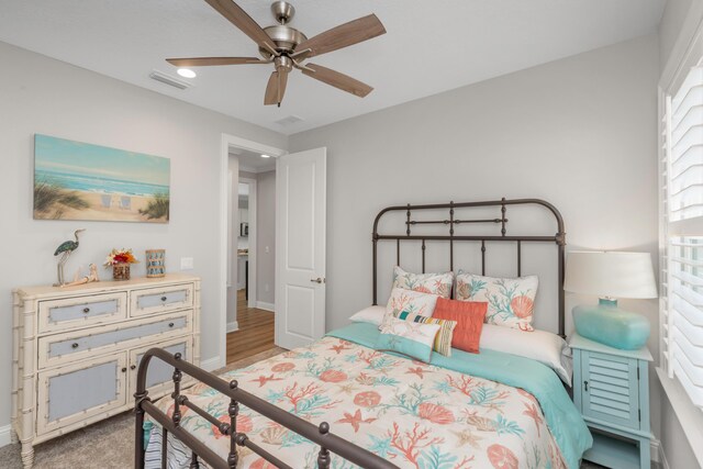 105 Oyster Blvd, Freeport, FL 32439 - bedroom with ceiling fan, visible vents, and baseboards