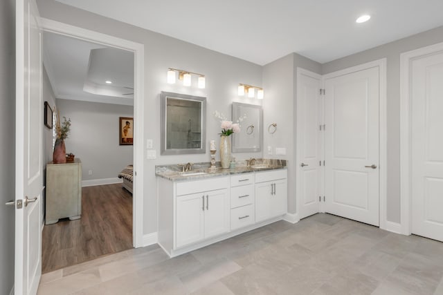 105 Oyster Blvd, Freeport, FL 32439 - bathroom with double vanity, baseboards, connected bathroom, a sink, and recessed lighting