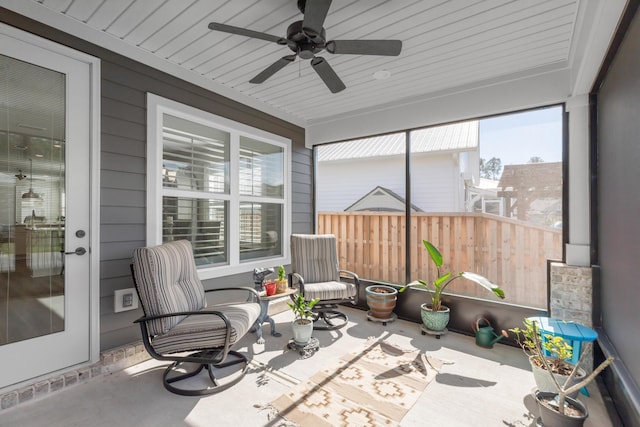 105 Oyster Blvd, Freeport, FL 32439 - sunroom featuring a ceiling fan