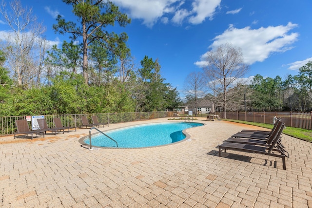 105 Oyster Blvd, Freeport, FL 32439 - pool featuring a patio area and fence