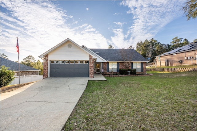 ranch-style house with brick siding, an attached garage, fence, driveway, and a front lawn