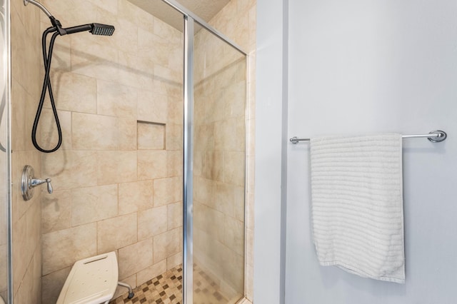 bathroom featuring a stall shower