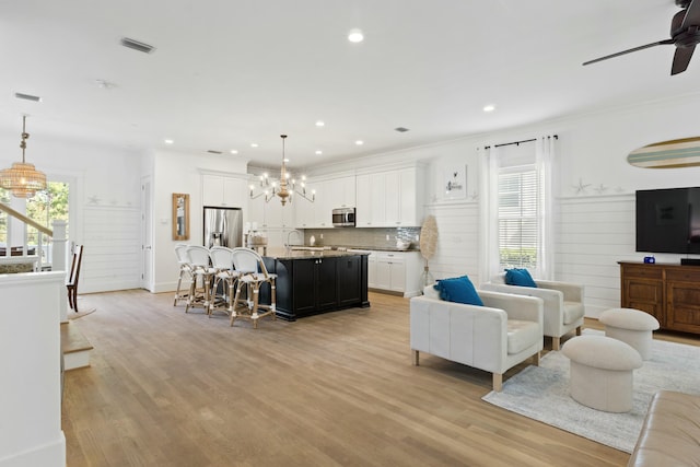 125 Gulfview Cir, Santa Rosa Beach, FL 32459 - living room featuring light wood-type flooring, sink, and plenty of natural light