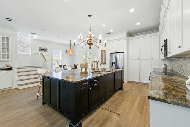 125 Gulfview Cir, Santa Rosa Beach, FL 32459 - kitchen featuring a spacious island, white cabinetry, stainless steel appliances, and pendant lighting