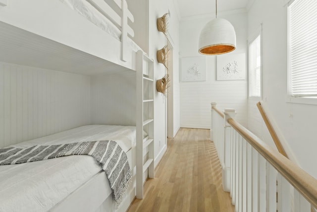 125 Gulfview Cir, Santa Rosa Beach, FL 32459 - bedroom with ornamental molding and light hardwood / wood-style floors