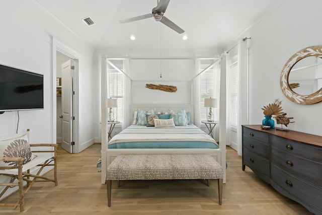 125 Gulfview Cir, Santa Rosa Beach, FL 32459 - bedroom with multiple windows, lofted ceiling, light wood-type flooring, and ceiling fan