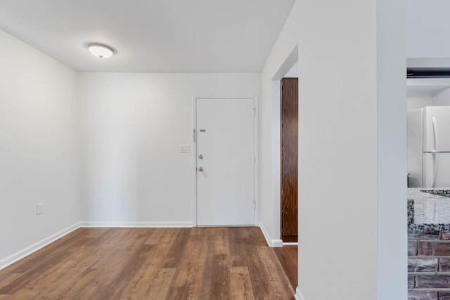 interior space with dark hardwood / wood-style flooring