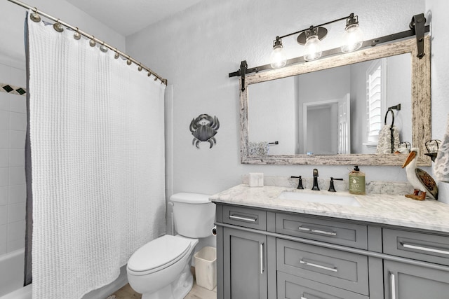 bathroom with toilet, shower / bathtub combination with curtain, and vanity