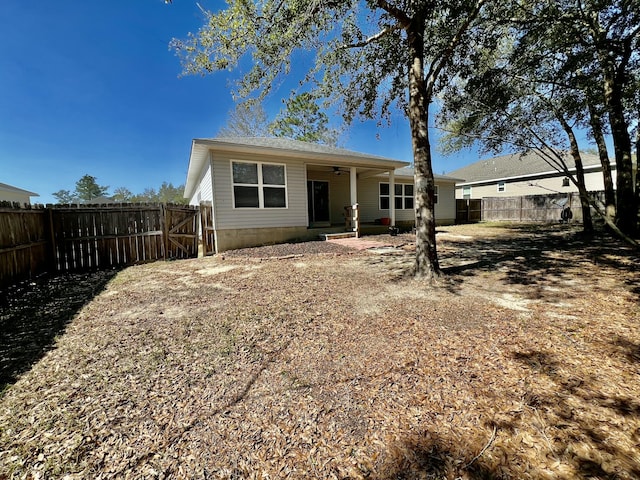 view of front of house featuring a fenced backyard