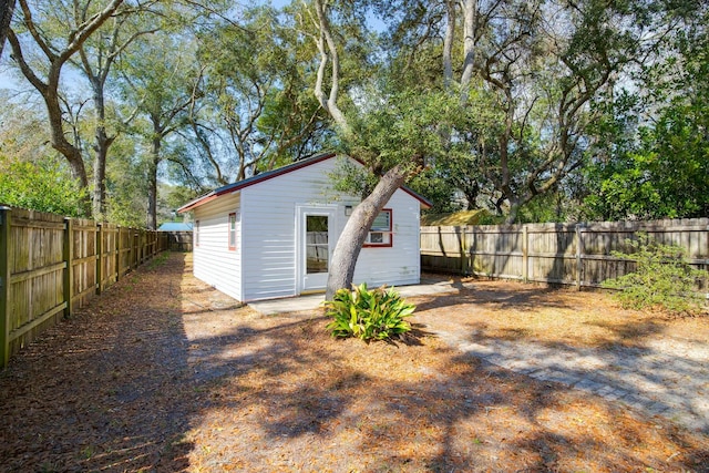 view of outbuilding with a fenced backyard