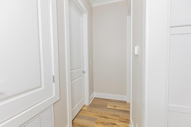 corridor with light wood-type flooring