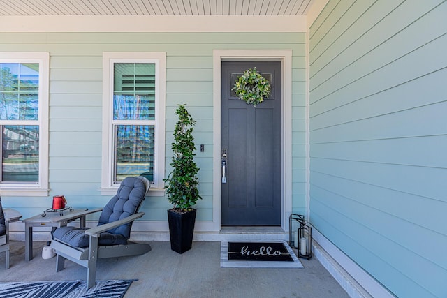 property entrance featuring a porch