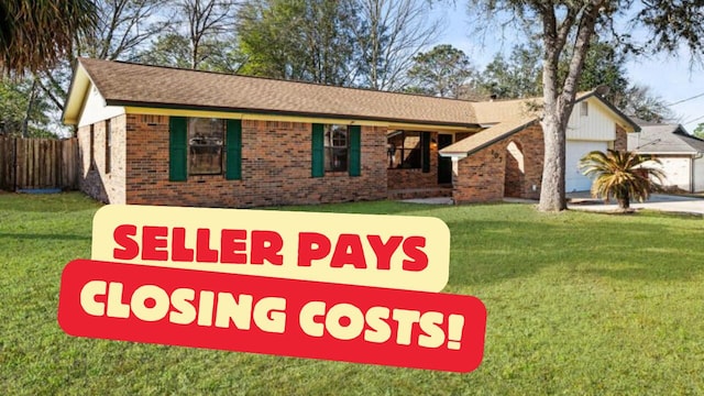107 Campbell Ave, Crestview, FL 32536 - view of front of property featuring brick siding and a garage