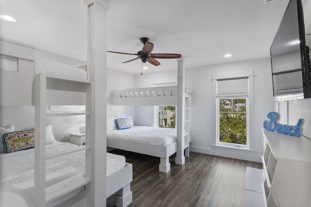 bedroom featuring baseboards, ceiling fan, wood finished floors, and recessed lighting