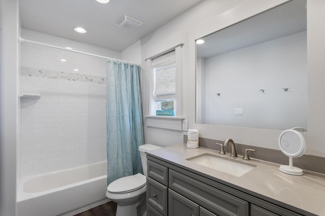 bathroom featuring shower / bath combo, visible vents, toilet, vanity, and recessed lighting