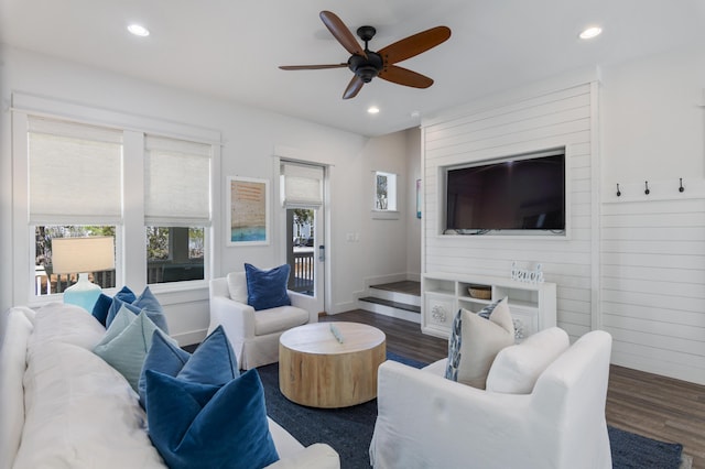 living area featuring a ceiling fan, wood finished floors, and recessed lighting