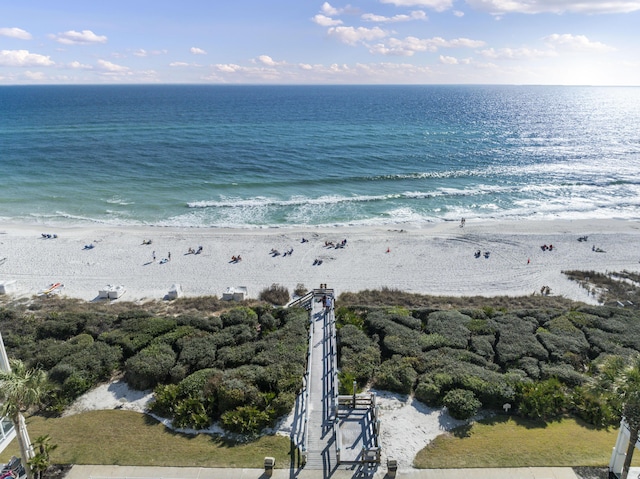 birds eye view of property featuring a water view and a view of the beach