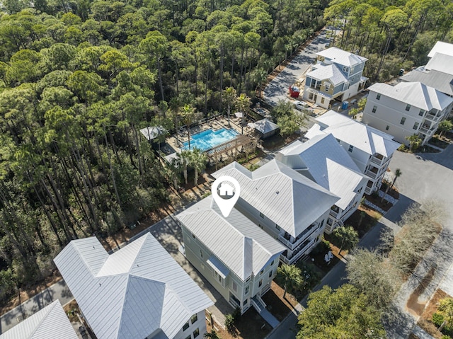 bird's eye view featuring a view of trees