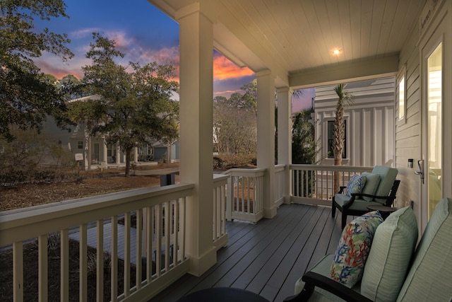 wooden terrace with covered porch