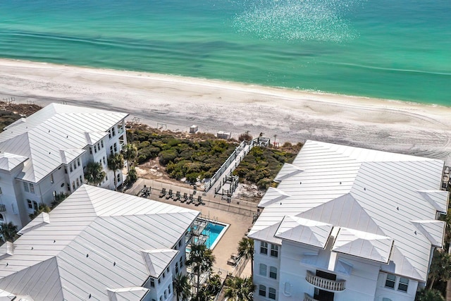 aerial view featuring a water view and a beach view