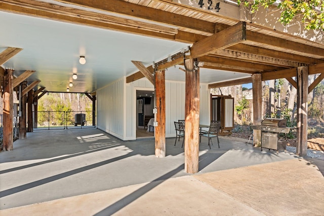 view of patio featuring area for grilling and cooling unit