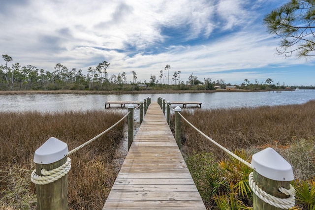 view of dock with a water view