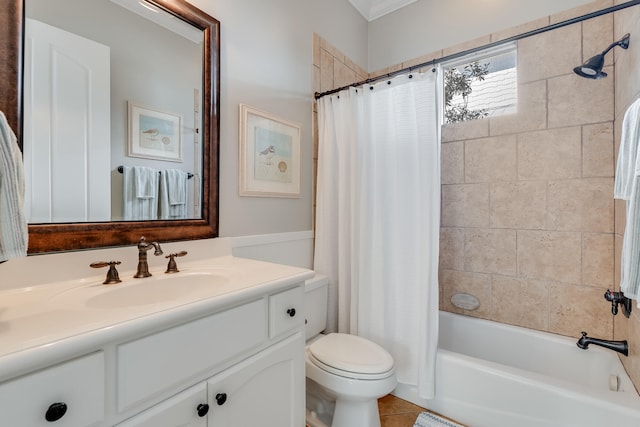 bathroom with toilet, shower / tub combo, vanity, and tile patterned floors